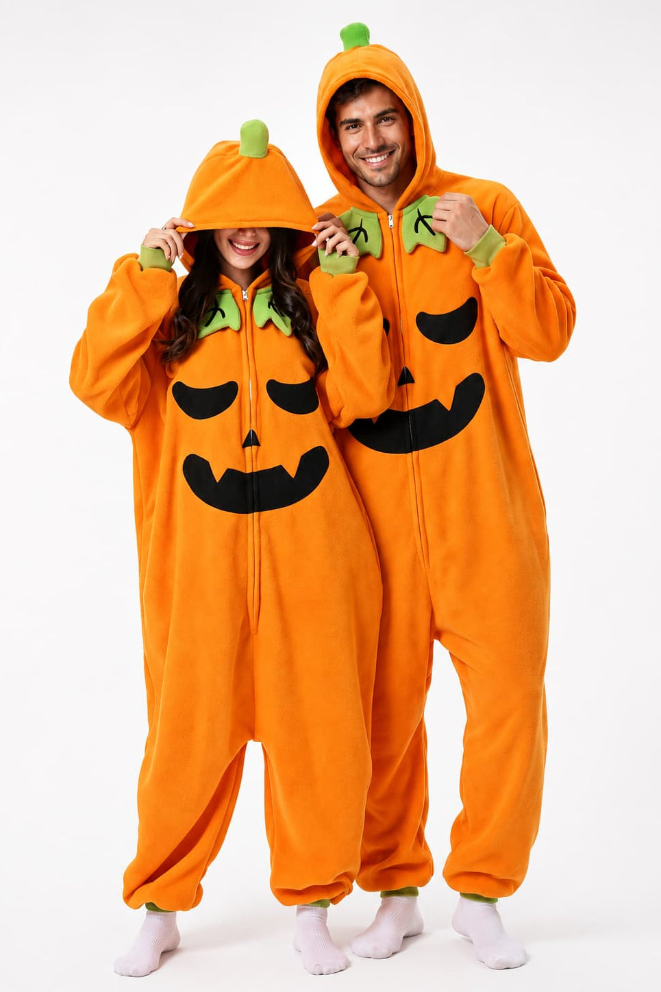a couple wearing pumpkin onesie kigurumi
